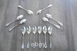 12 old small solid silver teaspoons Minerva