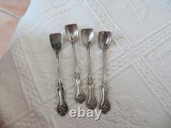 4 antique solid silver salt spoons by L & R and 2 crossed oars