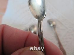 4 antique solid silver salt spoons by L & R and 2 crossed oars