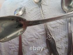 4 antique solid silver salt spoons by L & R and 2 crossed oars