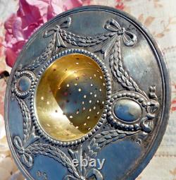 ANTIQUE SILVER TEA STRAINER FROM THE 19TH CENTURY IN LOUIS XVI STYLE, Weight 64 g