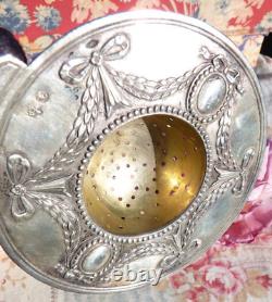 ANTIQUE SILVER TEA STRAINER FROM THE 19TH CENTURY IN LOUIS XVI STYLE, Weight 64 g