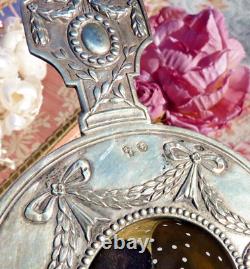 ANTIQUE SILVER TEA STRAINER FROM THE 19TH CENTURY IN LOUIS XVI STYLE, Weight 64 g