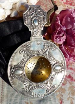 ANTIQUE SILVER TEA STRAINER FROM THE 19TH CENTURY IN LOUIS XVI STYLE, Weight 64 g