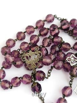 Amethyst bead rosary with solid silver medal and antique crucifix Amethyst bead rosary with solid silver medal and antique crucifix