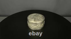 Ancient Asian powder compact in chased silver