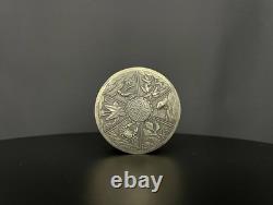 Ancient Asian powder compact in chased silver