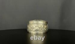 Ancient Asian powder compact in chased silver