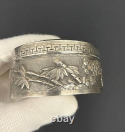 Ancient Asian powder compact in chased silver