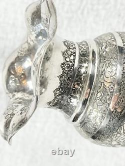 Ancient Oriental Vase with Flying Edges, Featuring Animated and Floral Decorations in Solid Silver