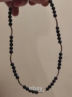 Ancient solid silver and onyx necklace.