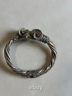 Ancient solid silver bangle bracelet with 925 hallmark, ram heads, weight 42.63