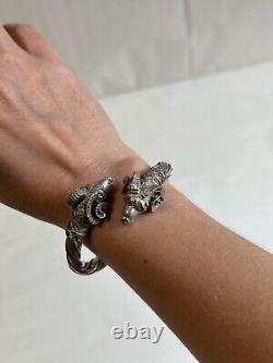 Ancient solid silver bangle bracelet with 925 hallmark, ram heads, weight 42.63