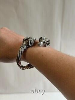 Ancient solid silver bangle bracelet with 925 hallmark, ram heads, weight 42.63