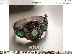 Ancient solid silver bracelet with green stones