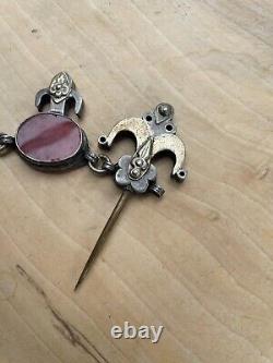 Ancient solid silver fibula jewelry with oriental Russian Turkmen ethnic carnelian