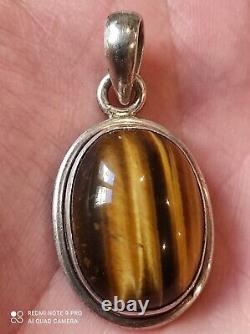 Ancient solid silver pendant and tiger's eye