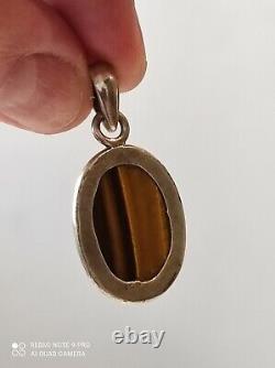Ancient solid silver pendant and tiger's eye