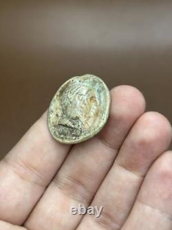 Ancient solid silver tetradrakhm coin of the Greek-Bactrian king