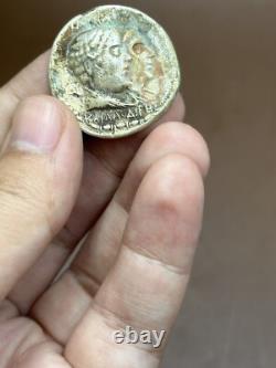 Ancient solid silver tetradrakhm coin of the Greek-Bactrian king