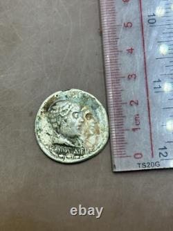 Ancient solid silver tetradrakhm coin of the Greek-Bactrian king