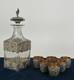 Antique Indonesian Liqueur Set With Silver Deity Motifs, Crystal Decanter, And Goblets