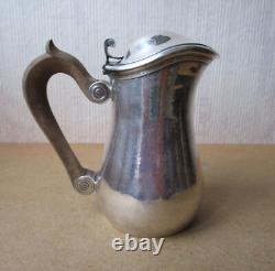 Antique beautiful selfish jug marabout style in hammered solid silver Minerva