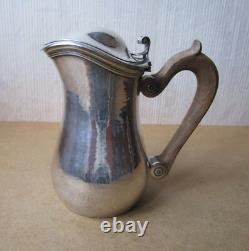 Antique beautiful selfish jug marabout style in hammered solid silver Minerva