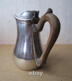 Antique beautiful selfish jug marabout style in hammered solid silver Minerva