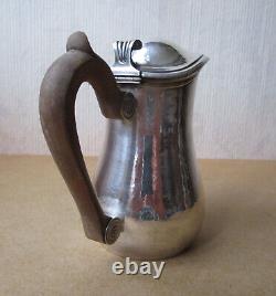 Antique beautiful selfish jug marabout style in hammered solid silver Minerva