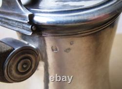 Antique beautiful selfish jug marabout style in hammered solid silver Minerva