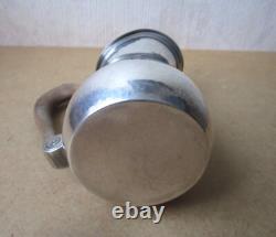 Antique beautiful selfish jug marabout style in hammered solid silver Minerva