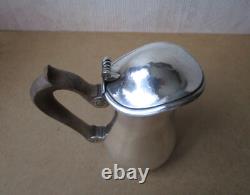 Antique beautiful selfish jug marabout style in hammered solid silver Minerva