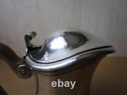 Antique beautiful selfish jug marabout style in hammered solid silver Minerva