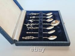 Antique box set of 7 small solid silver spoons, 833 silver, Colonial decoration, early 20th century