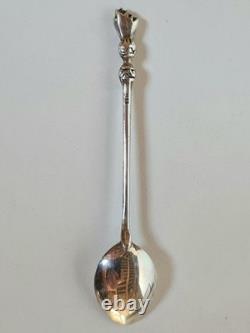 Antique box set of 7 small solid silver spoons, 833 silver, Colonial decoration, early 20th century