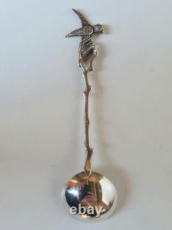 Antique box set of 7 small solid silver spoons, 833 silver, Colonial decoration, early 20th century