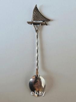 Antique box set of 7 small solid silver spoons, 833 silver, Colonial decoration, early 20th century