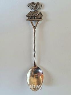 Antique box set of 7 small solid silver spoons, 833 silver, Colonial decoration, early 20th century