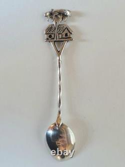 Antique box set of 7 small solid silver spoons, 833 silver, Colonial decoration, early 20th century