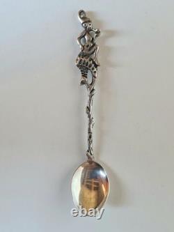 Antique box set of 7 small solid silver spoons, 833 silver, Colonial decoration, early 20th century