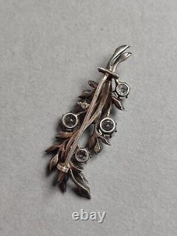 Antique brooch in silver and rhinestones