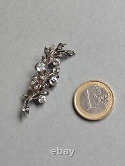 Antique brooch in silver and rhinestones