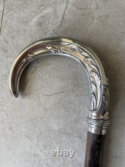 Antique cane with silver handle