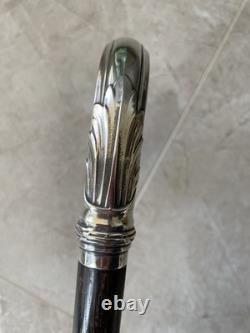 Antique cane with silver handle