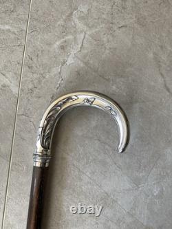 Antique cane with silver handle