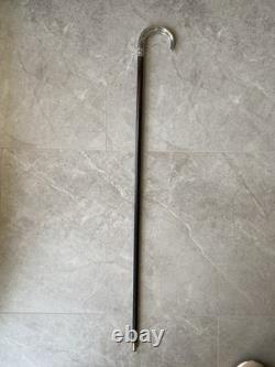 Antique cane with silver handle