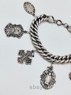 Antique charm bracelet with medals in solid silver, 19th century