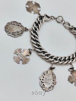 Antique charm bracelet with medals in solid silver, 19th century