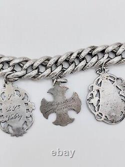 Antique charm bracelet with medals in solid silver, 19th century